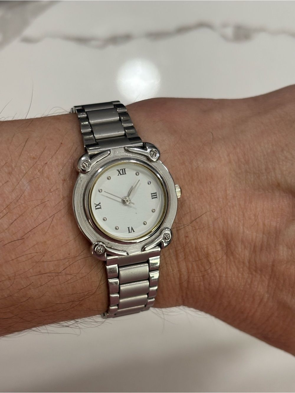 Satin Silver Round Face Stainless Steel Womens Wristwatch 7 1/8” Roman Numerals